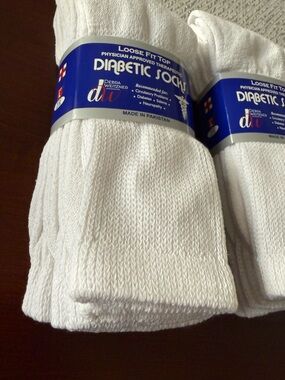 NWT. Pack of loose fit top socks - white. Great for circulatory problems